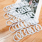 Black Elastic Hair Bands – High Stretch Rubber Ties for Ponytail Styling