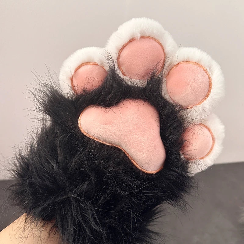 Fluffy black and white cat paw glove with pink paw pads, novelty costume accessory