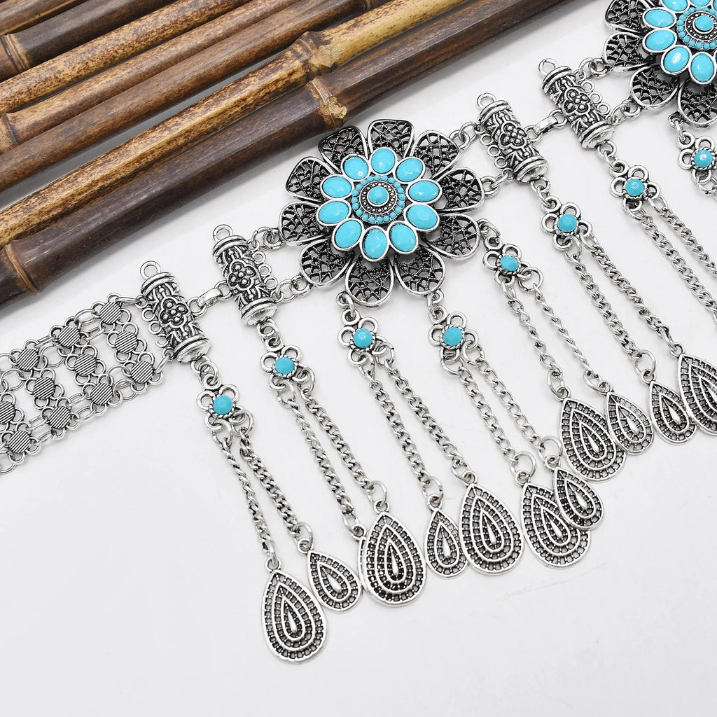Boho silver statement necklace with turquoise stones and floral charm details