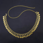 Gold coin chain necklace with multiple dangling coins on black background