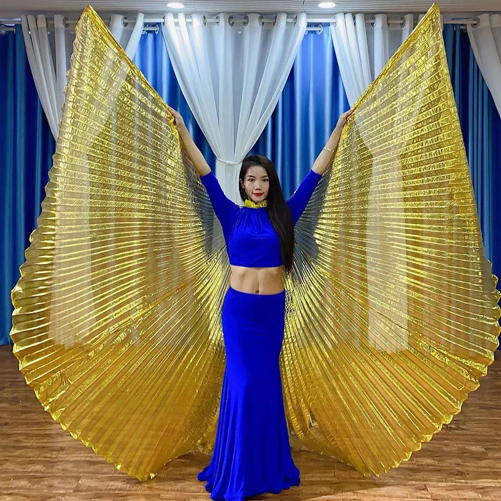 Woman in blue costume posing with large gold angel wings indoors
