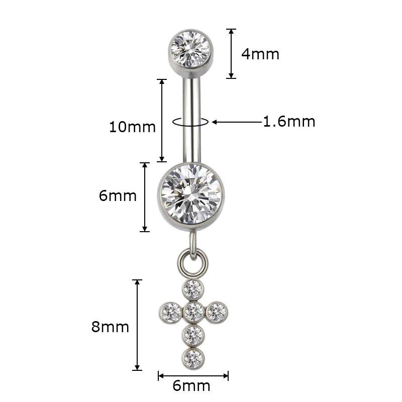 Silver belly button ring with clear gemstones, cross charm, and labeled size measurements.
