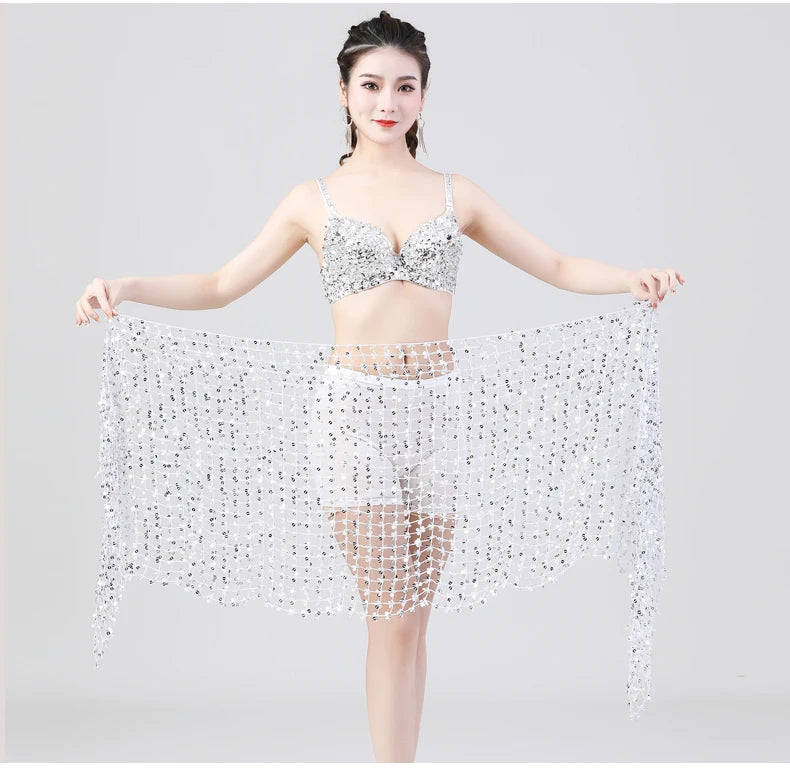 Woman wearing a silver sequin bra top and holding a sheer mesh sequin belly dance scarf