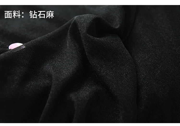 Close-up of black linen blend fabric with smooth texture and subtle sheen
