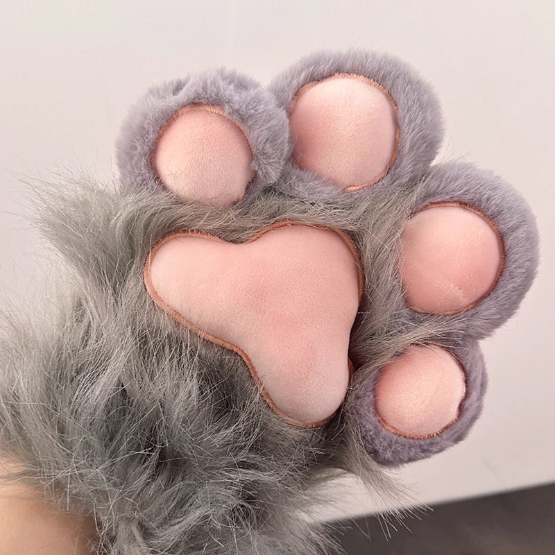 Plush grey cat paw glove with soft pink pads, novelty home and lifestyle accessory