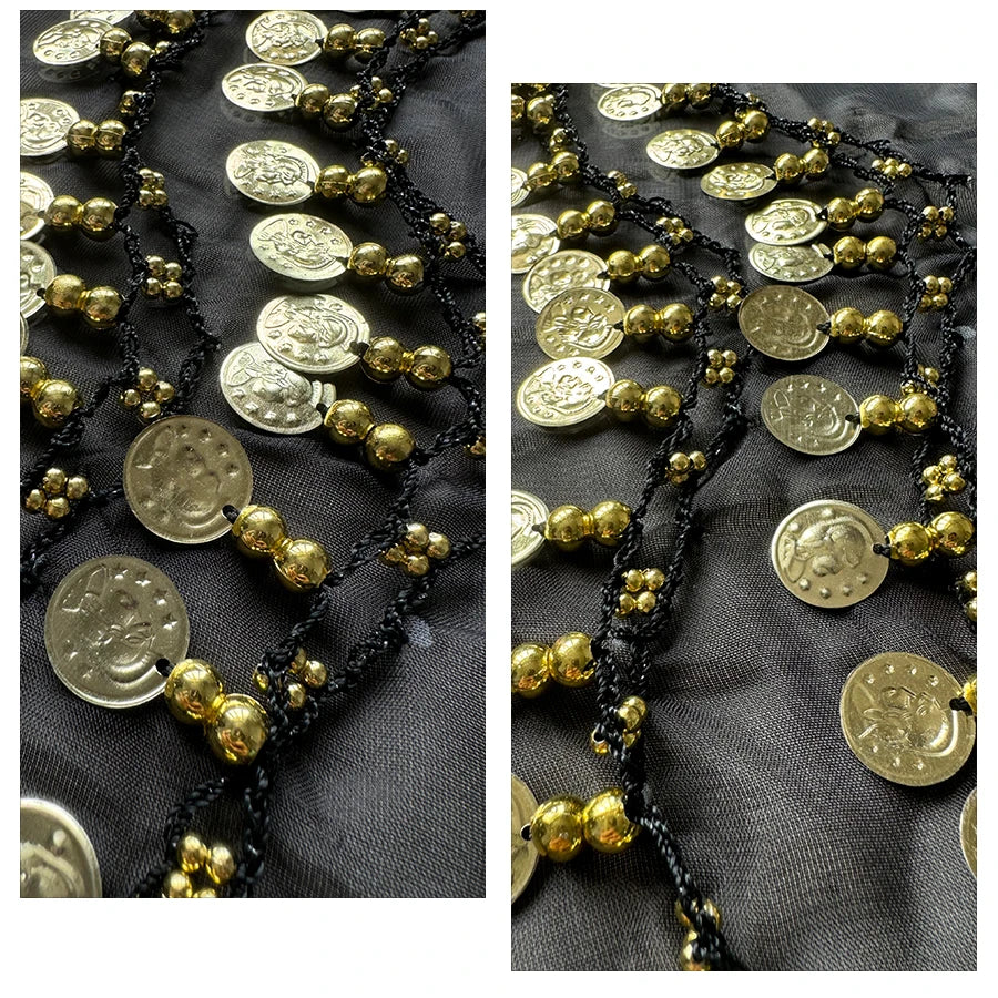 Close-up of gold coin beads and black thread on fabric, decorative accessory detail