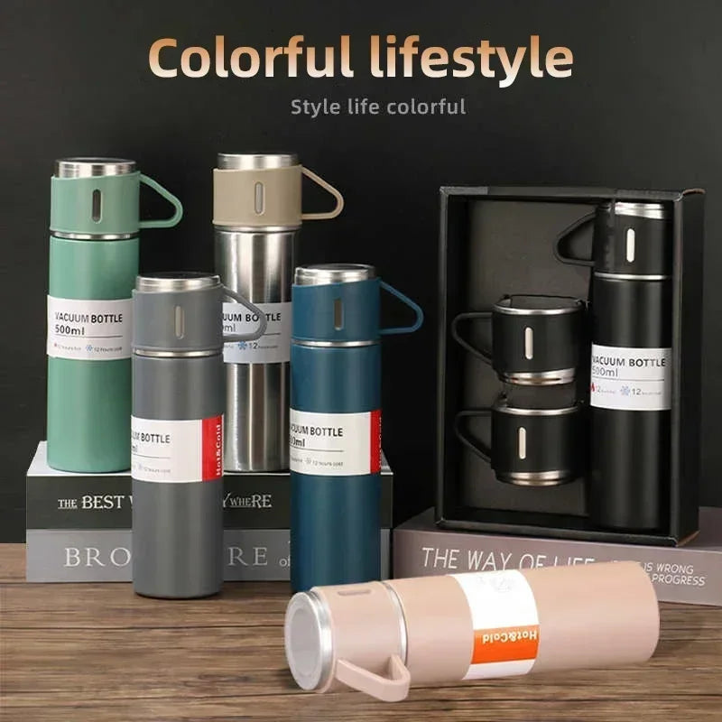 Colorful 500ml vacuum insulated bottles and mugs on display with modern home decor style.