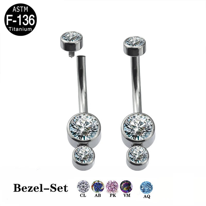 Titanium bezel-set belly button rings with clear and colored crystal options