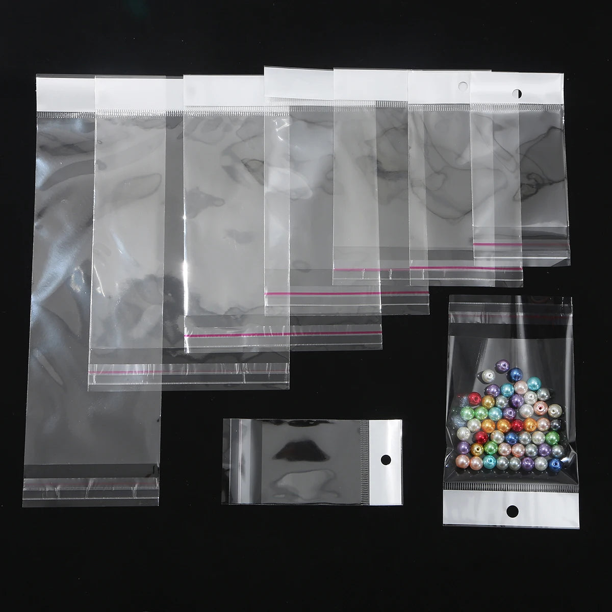 Self-Sealing Cellophane Bags – Transparent Adhesive Packaging for Gifts and Treats
