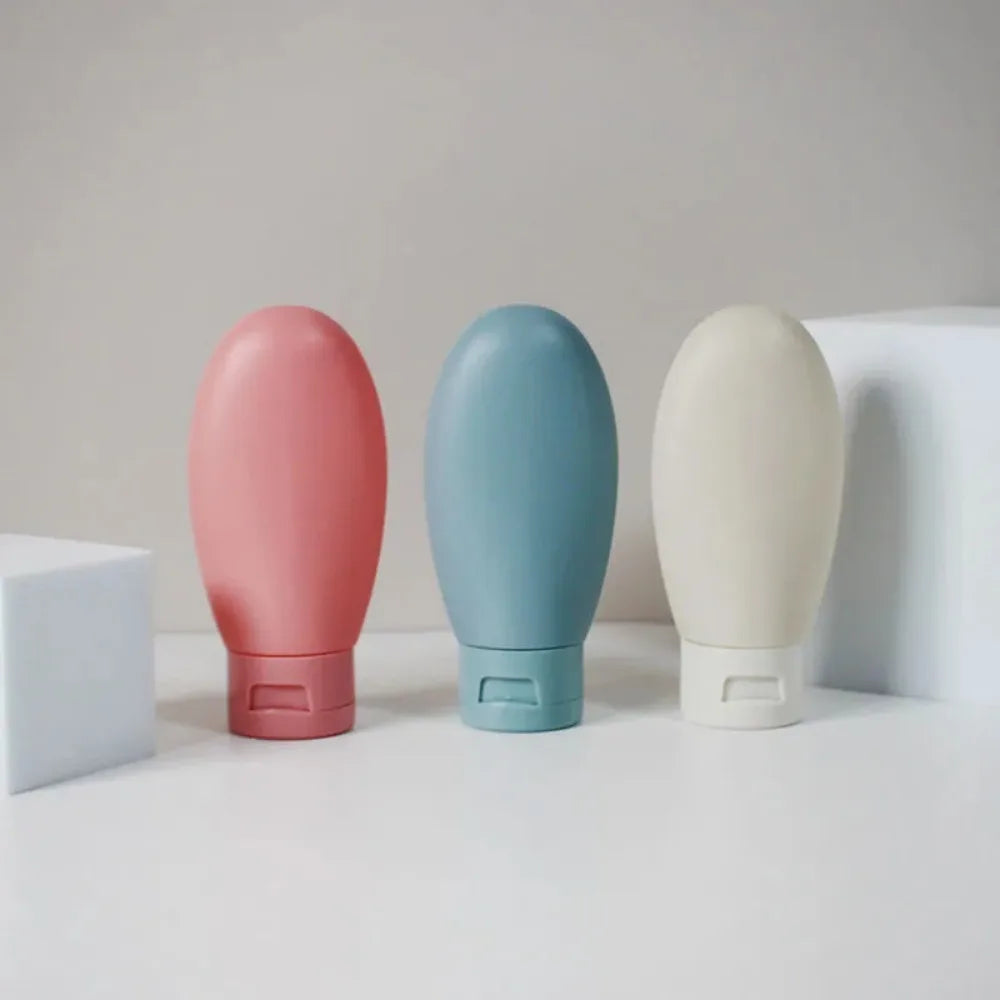 Refillable Travel Bottle Set – 60ml Squeeze Tubes for Cosmetic Toiletries