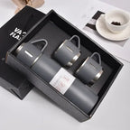 Gray vacuum flask and two matching cups gift set in a black box for outdoor use