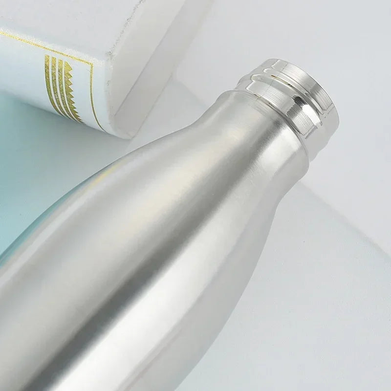 Stainless steel water bottle with a screw cap on a white background