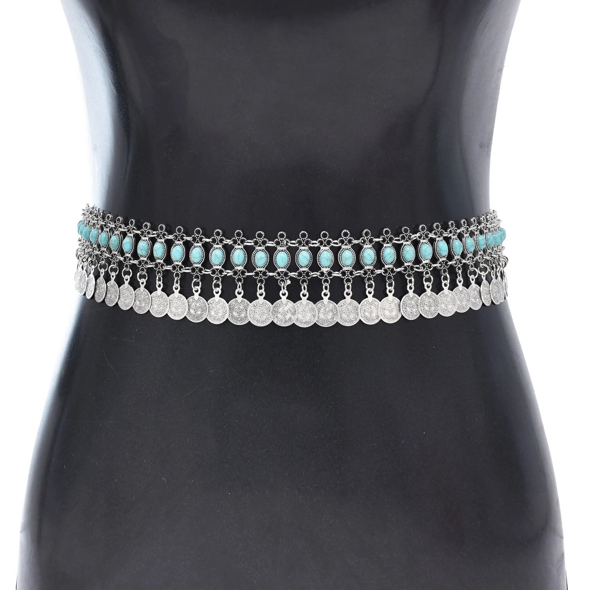 Boho silver coin waist belt with turquoise accents on mannequin, belly dance accessory