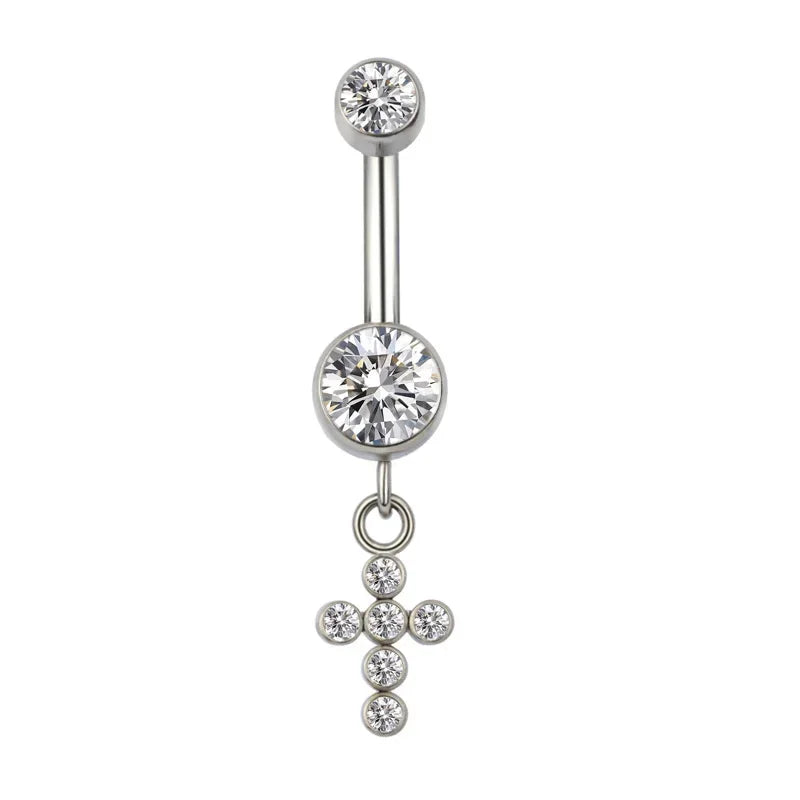 Silver belly button ring with clear gemstones and a dangling cross charm