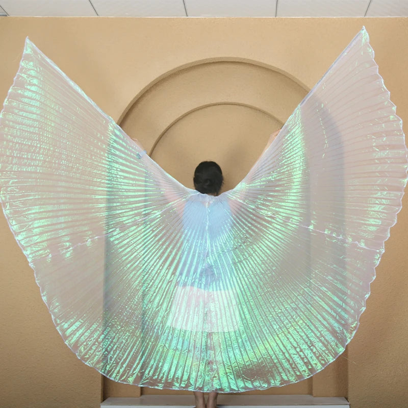 Woman wearing iridescent pleated costume wings indoors, back view