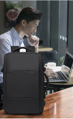 Expandable 17.3-inch Laptop Backpack – Waterproof Travel Bag for Men